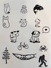 Load image into Gallery viewer, image of some of the stamps that are available in addition to text. owl, robot, salmon, sleepy cat, cat, striped cat, puppy, pug, heart in speech bubble, bike, crab, tree, slug, sasquatch