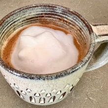 Load image into Gallery viewer, Foamed milk shown in an espresso mug. wheelthrown carved mugs glazed in rustic white glaze. the carved facets show through the white glaze. these mugs are dishwasher safe.