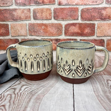 Load image into Gallery viewer, carved mugs with vertical pattern and tree pattern. hand carved artisan made mug by Meredith Chernick
