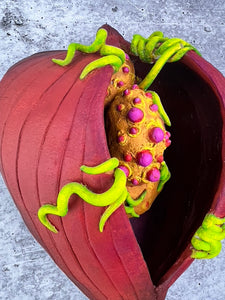 artist sculpted seedpods, inspired by nature