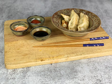 Load image into Gallery viewer, Sauce bowls for soy, hot sauce, whatever you need to put in tiny bowls. wheelthrown pottery bowls made of stoneware. Tea bag holders, ring holders. made at Fern Street Pottery