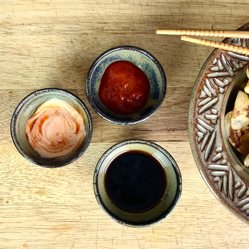Sauce bowls for soy, hot sauce, whatever you need to put in tiny bowls. wheelthrown pottery bowls made of stoneware. Tea bag holders, ring holders. made at Fern Street Pottery