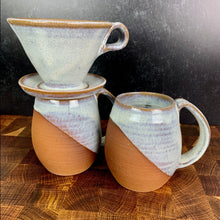 Load image into Gallery viewer, Showing two mugs from the coffee gift set including two angle dipped coffee mugs, one coffee pour over and a matching bud vase. handcrafted, wheel thrown stoneware pottery