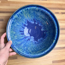 Load image into Gallery viewer, Large, wheel thrown serving bowl. Thrown in a deep red stoneware and glazed in &quot;Blue World&quot; which is layers of blues and turquoise, running together