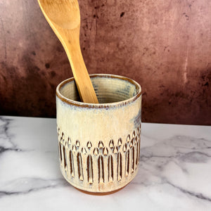 utensil holder, wheel thrown stoneware, handcarved texture. red clay with speckled white glaze