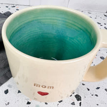 Load image into Gallery viewer, White clay, turquoise glaze on the inside. this mug was wheel thrown and Glazed with the Glaze Splash Glaze Fountain, by Meredith at Fern Street Pottery