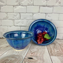 Load image into Gallery viewer, wheelthrown blue world bowl. the bowl is glazed in cobalt blue with turquoise green glaze melting down into the blue from the rim of the bowls. 