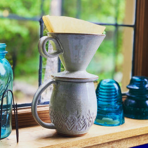 Coffee pour over with finger loop handle, wheel-thrown pottery, white glaze with speckles. Fern Street Pottery