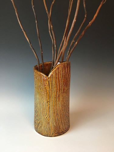 pottery vase, texturized to appear as woodgrain, log, tree