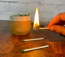 Load image into Gallery viewer, Pottery match striker made from stoneware. Strike on Pot with &quot;Strike anywhere&quot; matches.wheel thrown at Fern Street Pottery. shown here just after striking